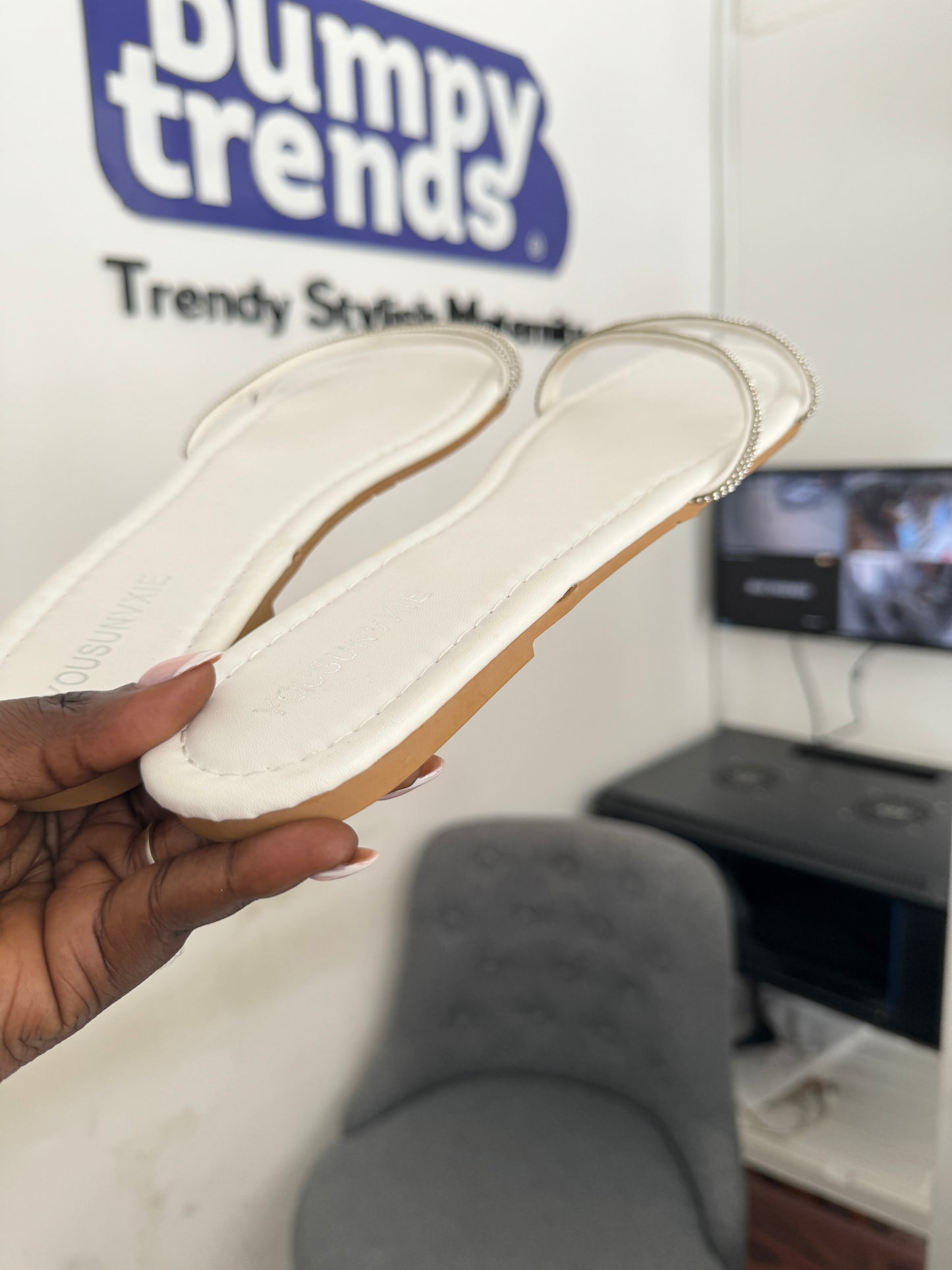 Assymetric strap embellished flat slippers